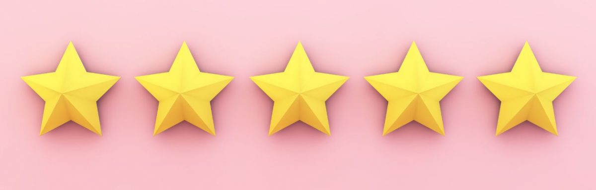 Five yellow stars on a pink background